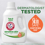 ARM & HAMMER Sensitive Skin detergent bottle with large SkinSAFE badge and text “Dermatologist Tested” on textured backdrop