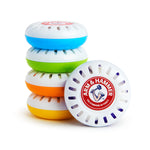 Four colorful stacked Arm & Hammer nursery freshener pods with one pod facing forward showing the red logo