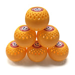 Six orange Arm & Hammer odor balls stacked in a pyramid on a white background with brand logo tops