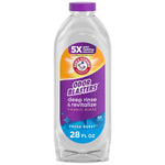 Clear plastic bottle of ARM & HAMMER Odor Blasters fabric rinse with purple label and cap, fresh burst styling
