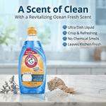 Arm & Hammer + OxiClean Ocean Fresh dish soap bottle on a countertop with shells and text about a revitalizing ocean scent.