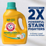 Yellow ARM & HAMMER Sensitive Skin detergent bottle beside text claiming 2x powerful stain fighters