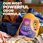 Arm & Hammer Deep Clean detergent bottle placed among a pile of laundry with promotional headline text
