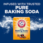 Arm & Hammer pure baking soda box shown with text 'INFUSED WITH TRUSTED PURE BAKING SODA' and a dusting of baking soda behind it