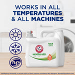 Arm & Hammer Sensitive Skin detergent jug on a wooden surface with icons and text 'Works in All Temperatures & All Machines'.