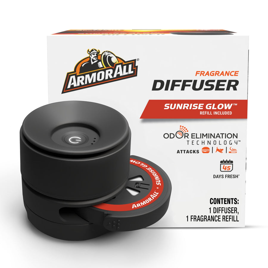 Armor All black car fragrance diffuser and visible refill beside branded Sunrise Glow packaging