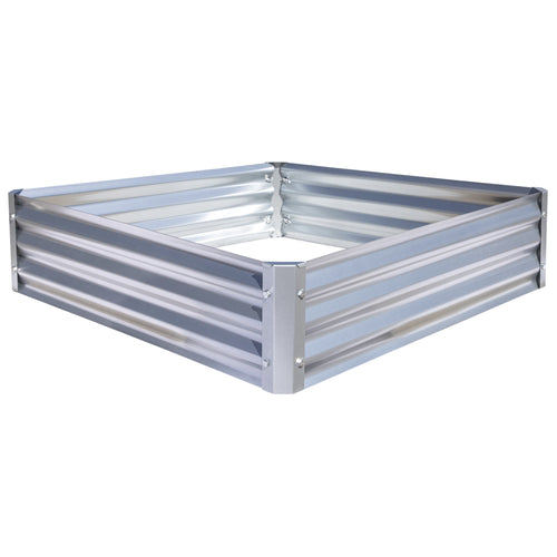Galvanized square corrugated metal raised garden bed assembled and viewed at an angle on white background.