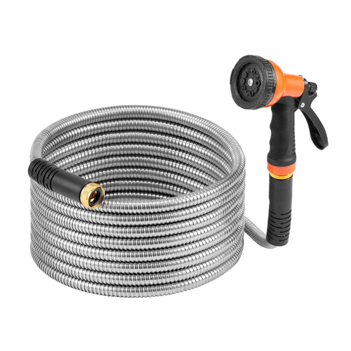 Coiled stainless-steel garden hose standing beside an orange and black handheld spray nozzle on a white background