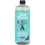 Tall clear bottle of Aunt Fannie’s teal-labeled ultra-concentrated multi-surface floor cleaner