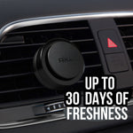 Close-up of a black AXE circular vent clip attached to a car air vent with text overlay about freshness