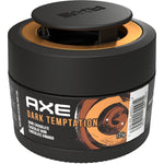 Close-up of a black AXE Dark Temptation gel can car air freshener with orange swirl label and embossed AXE cap.