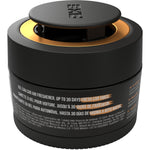 Rear-angle view of a black AXE gel can car air freshener with product copy on the label and an embossed AXE rotating cap.