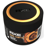 Top-down view of a black AXE Dark Temptation gel can air freshener showing illuminated orange ring and AXE logo on the cap.