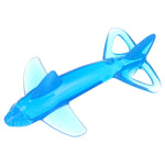 Close-up studio shot of a translucent blue shark-shaped silicone infant toothbrush on white background