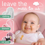 Smiling baby with food stains on a onesie and Dreft branding saying leave the mess to us on pink background