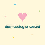 Pastel card graphic with a pink heart icon and the text "dermatologist tested" on a cream background.