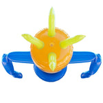 Top-down view of the orange inflatable sprinkler showing green top nozzles and blue arms and base