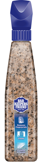 Slim Bar Keepers Friend Granite & Stone spray bottle with vertical label strip showing icons for removes fingerprints, cleans, protects and shines.