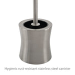 Close-up of stainless steel hourglass-shaped toilet brush canister with central brush handle and black bristles visible