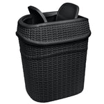 Close-up of matte black rattan-textured trash can with dual swing lids shown from a high angle