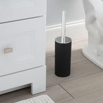 Bath Bliss matte black toilet brush set placed on bathroom floor beside vanity and toilet