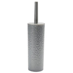 Silver hammered-texture cylindrical toilet brush holder with gray handle inserted showing closed top
