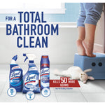 Bathroom scene with child stepping on a stool and a range of Lysol bathroom products arranged on tiled floor promoting a total bathroom clean