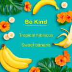 Graphic flat-lay with bananas, hibiscus flowers and text reading 'Be Kind Tropical hibiscus Sweet banana' on teal background.