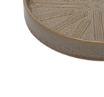 Close-up detail of the rim and interior textured surface of a gray-brown Better Homes & Gardens ceramic planter saucer.