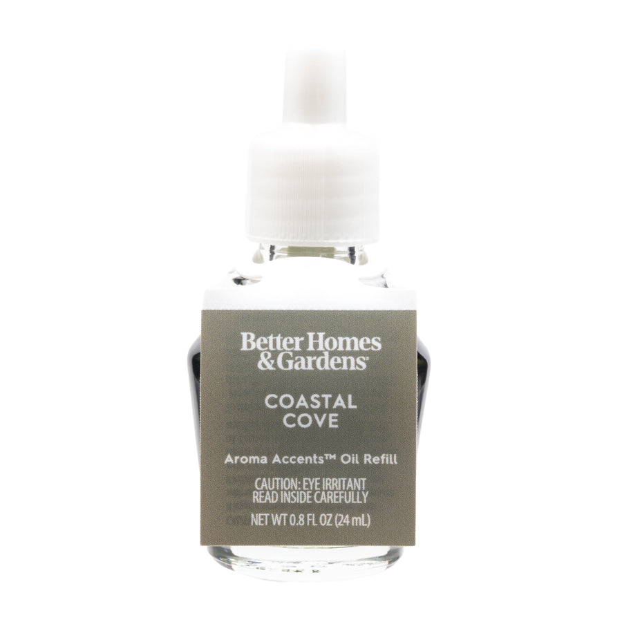 Clear glass refill bottle with white plastic cap labeled Better Homes & Gardens Coastal Cove fragrance oil