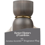 Ribbed dark gray fragrance plug displayed in partial product packaging labeled Better Homes & Gardens