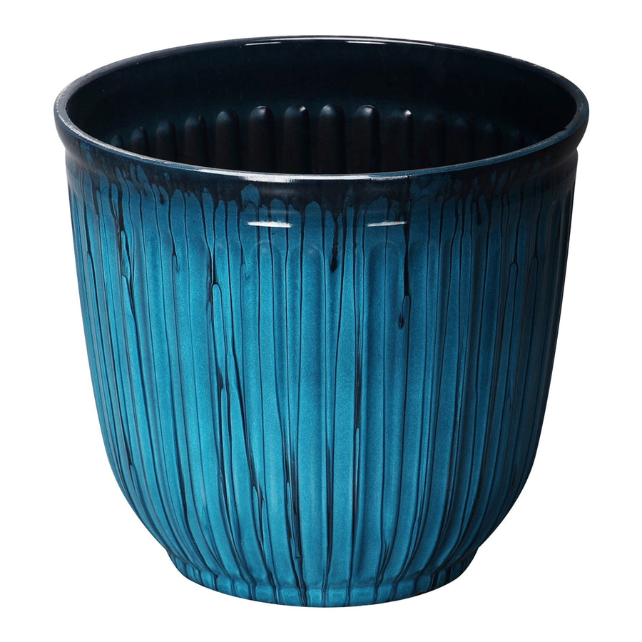 Glossy aqua ribbed round planter with dark interior and vertical textured drip detailing