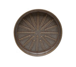 Top-down view of a round Better Homes & Gardens ceramic planter saucer with textured radial pattern and gray-brown glaze.