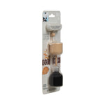 Angled view of Better Homes & Gardens hanging car air diffuser in retail blister pack with wooden cap and dark scent bottle
