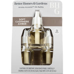 Retail blister pack showing three fragrance oil refill bottles labeled Soft Cashmere Amber with Better Homes & Gardens branding.