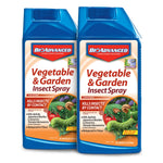 Two blue bottles of BioAdvanced Vegetable & Garden Insect Spray concentrate with product label and garden illustration.