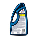 Rear view of blue BISSELL Hard Floor Sanitize bottle showing back label text and directions on a white background