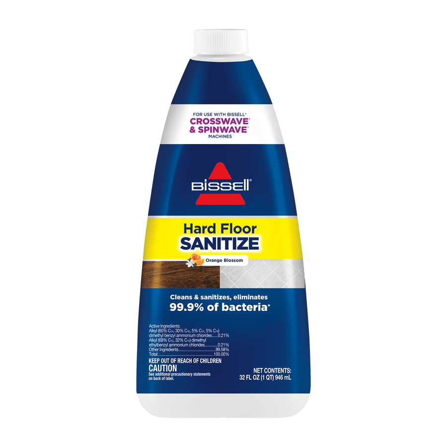 Front-facing BISSELL Hard Floor Sanitize bottle with blue, yellow and white label on plain background.