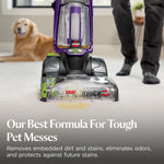 Upright BISSELL carpet cleaner running on carpet with dog in background and product usage text