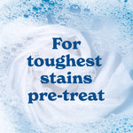 Soapy water and a rolled white garment with large text reading 'For toughest stains pre-treat' over the image.