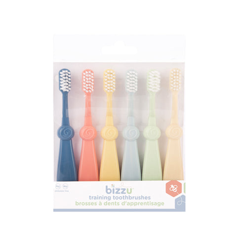 Six pastel Bizzu training toothbrushes in clear retail packaging with logo and label visible