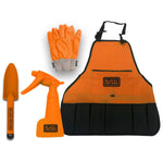 Flat-lay of an orange Black+Decker kids gardening set showing apron with logo, gloves, spray bottle and trowel on white background.