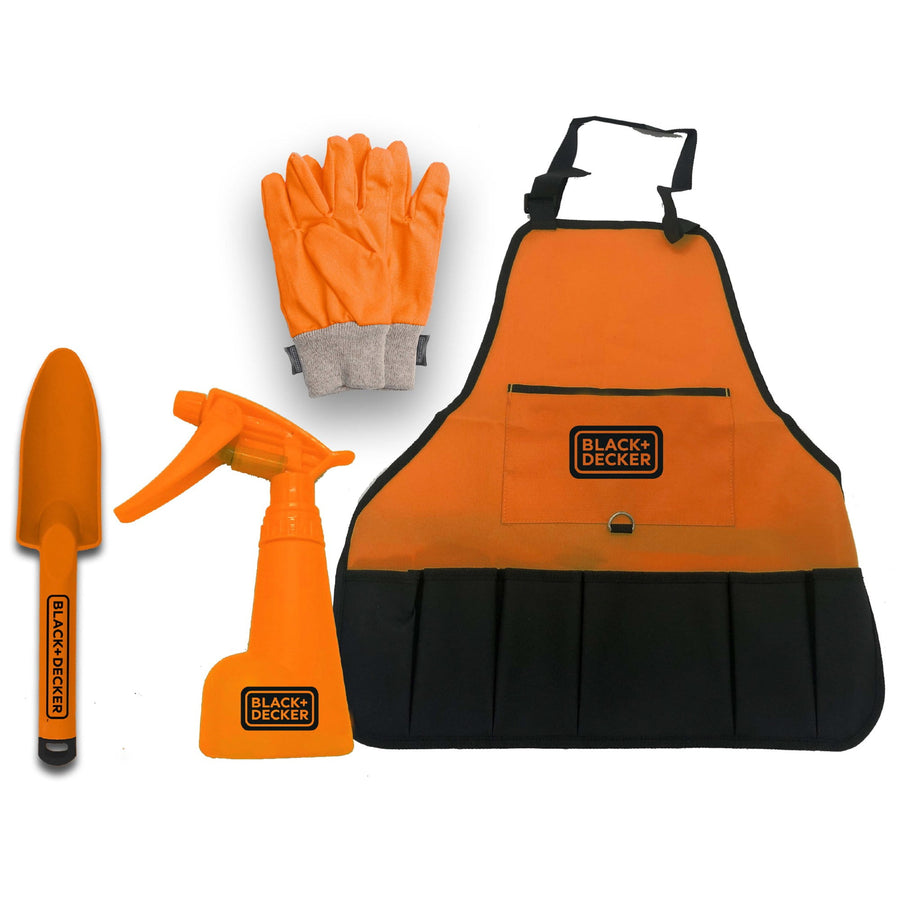 Flat-lay of an orange Black+Decker kids gardening set showing apron with logo, gloves, spray bottle and trowel on white background.