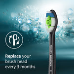 Black Philips Sonicare W DiamondClean brush head shown against a watery background with a replace-every-3-months message.