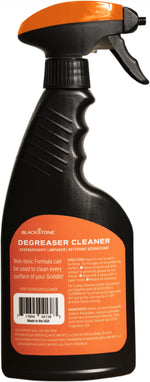Rear view of a Blackstone Degreaser Cleaner spray bottle showing orange label and ingredient text