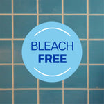 Tile background with a circular badge reading "BLEACH FREE" centered over blue grout tiles