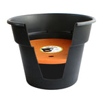Cutaway-style product shot showing an orange Ups-A-Daisy insert fitted inside a black planter pot.