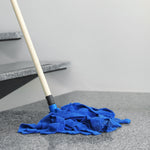 Blue microfiber mop head attached to a handle, shown mopping a textured gray stair surface