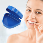 Open blue triangular braces/retainer case floating beside a smiling woman inserting a clear aligner.