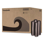 Large corrugated cardboard case with Boardwalk logo and stylized wave graphic, next to four rolled black trash bags.
